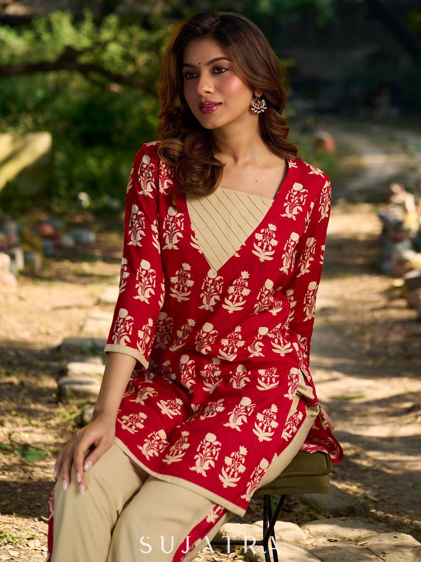 Vibrant red viscose short kurta showcasing a charming floral print, refined pintuck neck panel