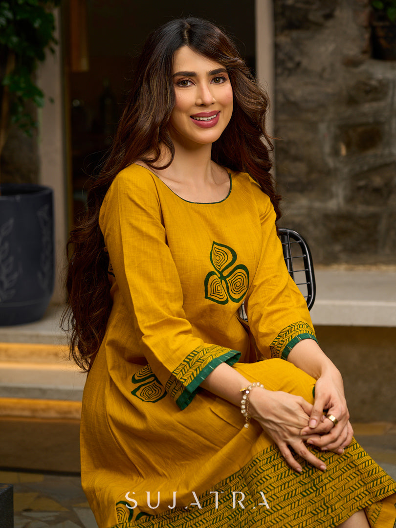 Contemporary Mustard Floral Hand Block Print Dress featuring Front & Back Box Pleat with Geometric Border on Hem & Sleeves