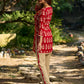 Vibrant red viscose short kurta showcasing a charming floral print, refined pintuck neck panel