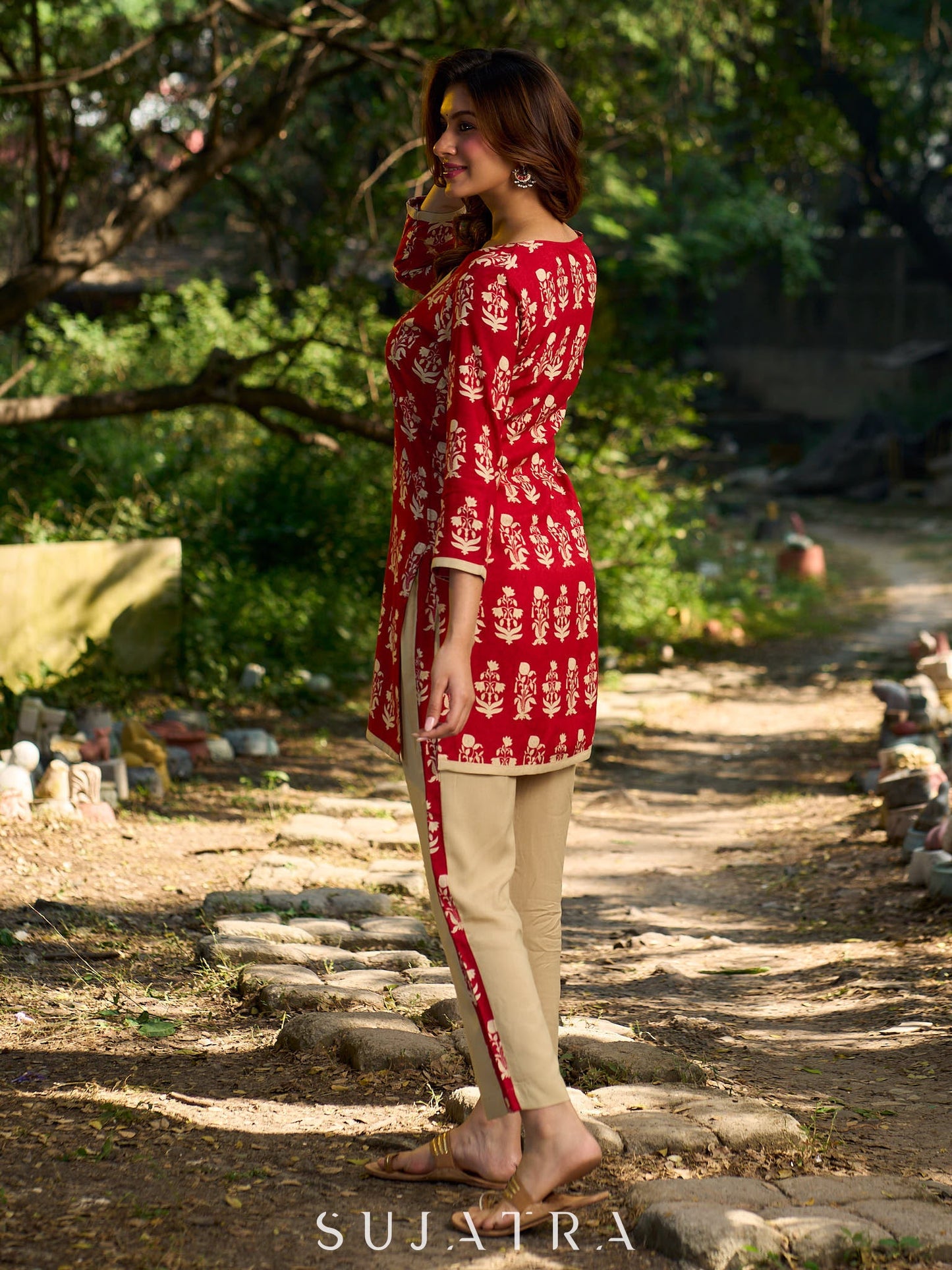 Vibrant red viscose short kurta showcasing a charming floral print, refined pintuck neck panel
