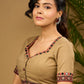 Exquisite hand embroidered dark beige ajrakh combination cotton blouse.
