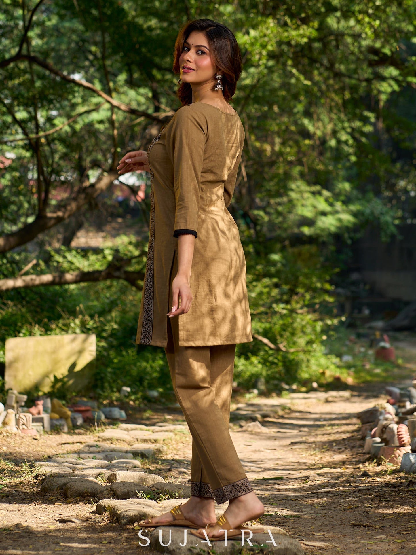 Minimal Sand Beige short kurta with a striking black Ajrakh border.