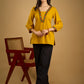 Elegant handcrafted mirror work mustard cotton top.