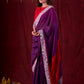Ethereal Dual-Tone Purple Mul Cotton Saree with Floral Border, Red Tassel Highlights & Intricate Embroidered Pallu