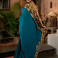 Teal cotton saree with Kalamkari border and rich khun border detailing