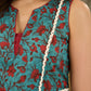 Flowy Green Floral Printed Cotton Dress with Flared Silhouette, Maroon Contrast Trims, and Crochet Lace Edges