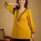Elegant handcrafted mirror work mustard cotton top.
