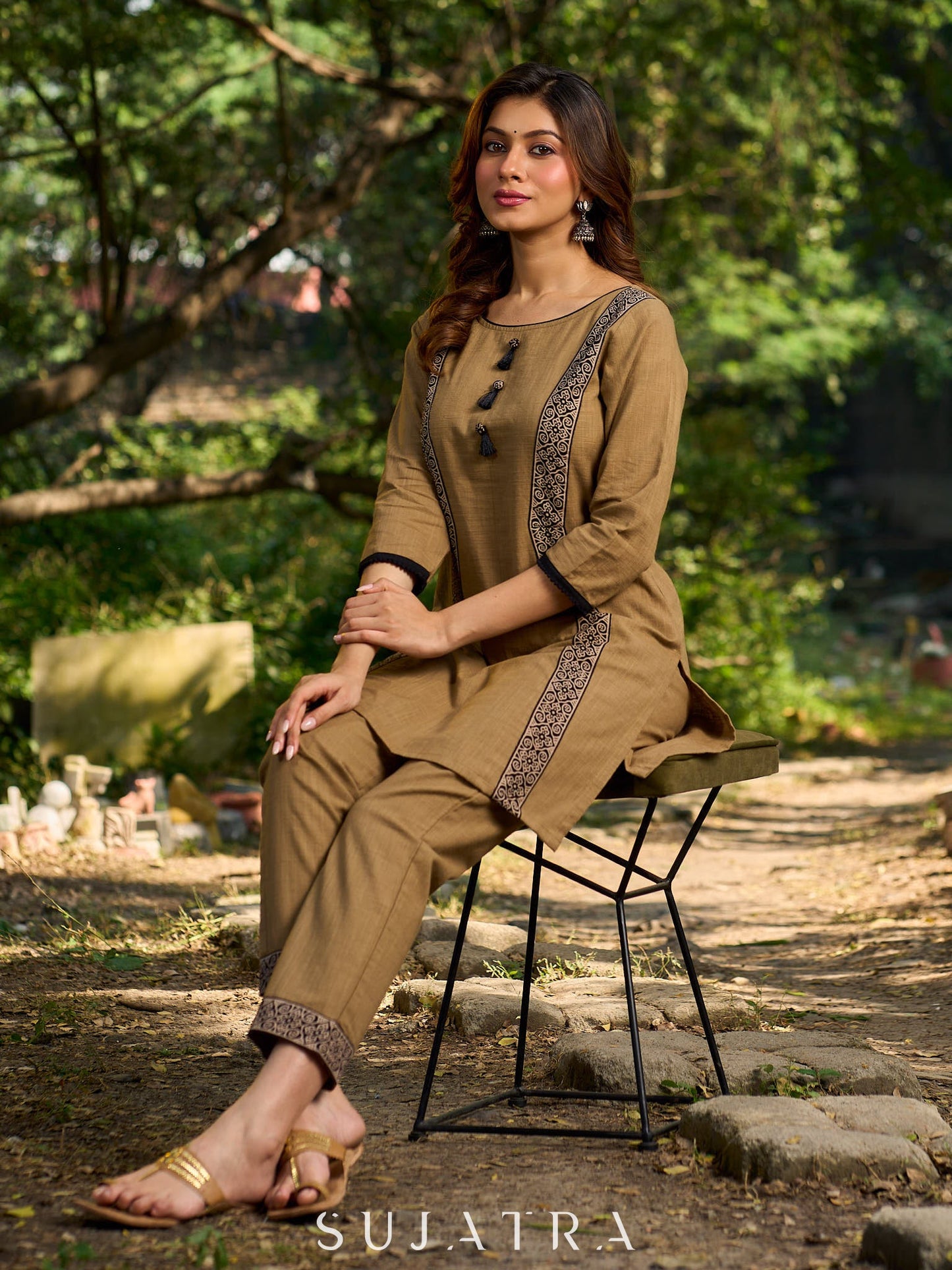 Minimal Sand Beige short kurta with a striking black Ajrakh border.