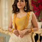 A chic off-white Hakoba Lehenga with intricate gold embroidery accented by a bold, saffron yellow blouse - Gold embroidered hakoba Shrug Optional