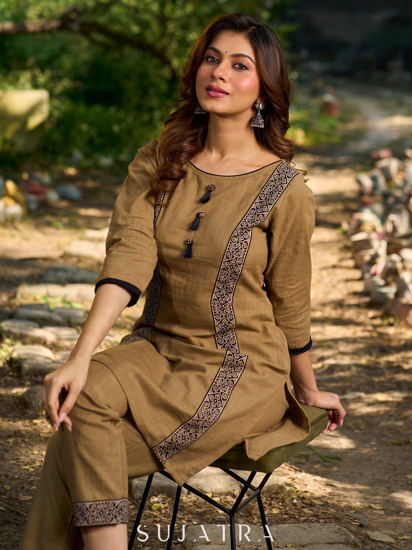 Minimal Sand Beige short kurta with a striking black Ajrakh border.