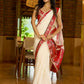 Heritage white Chanderi saree with benarasi border featuring artisanal hand-painted floral motifs