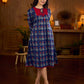 Royal blue Jaipur-printed dress featuring red rose motifs, a pintuck neck patch with red accents, and balloon 3/4th sleeves, creating a graceful silhouette with a blend of artisanal charm and contemporary elegance.