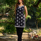 Black viscose sleeveless short kurta elevated with artistic stripe–floral patterns