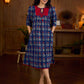 Royal blue Jaipur-printed dress featuring red rose motifs, a pintuck neck patch with red accents, and balloon 3/4th sleeves, creating a graceful silhouette with a blend of artisanal charm and contemporary elegance.