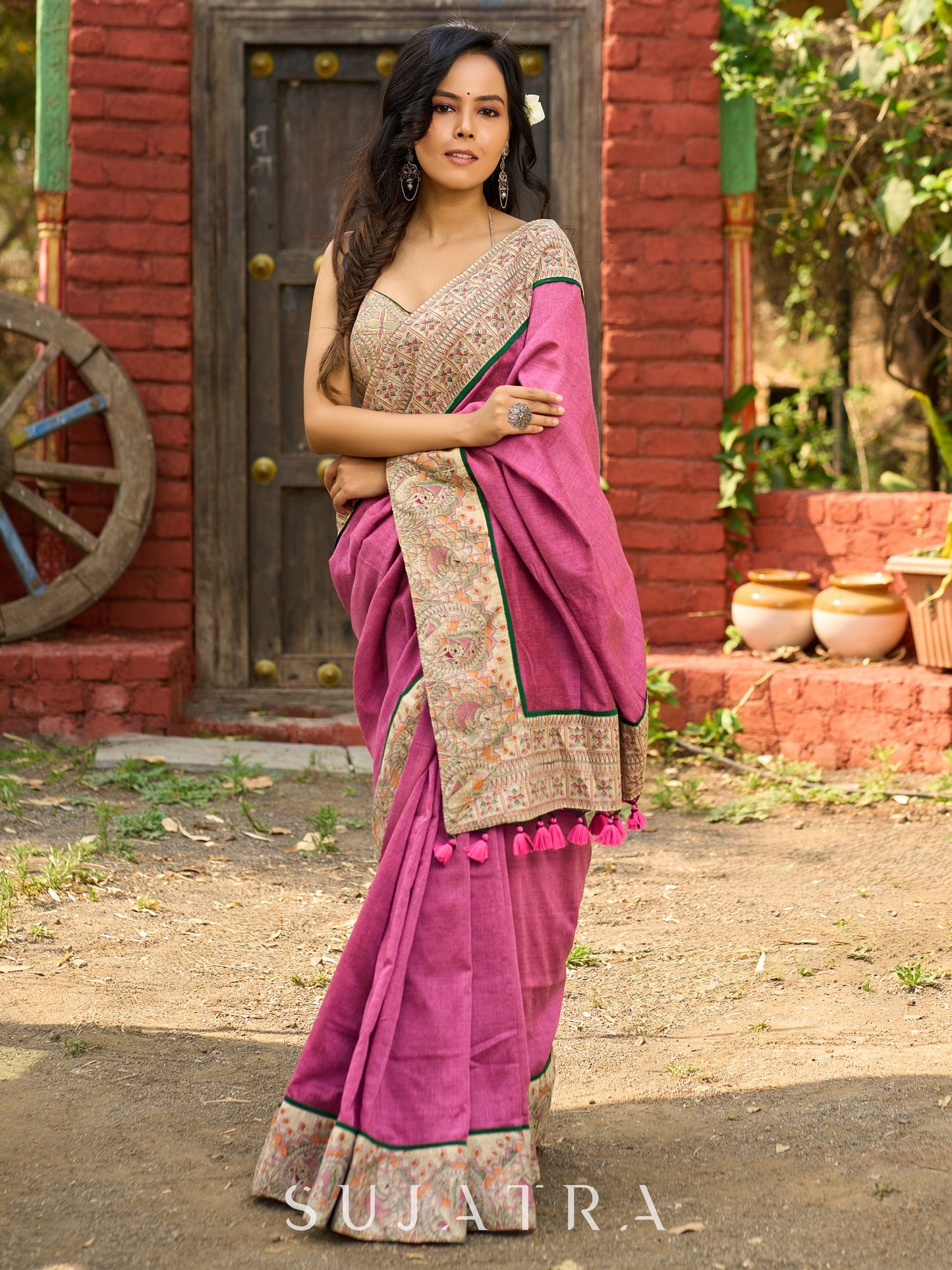 Orchid pink cotton saree with Madhubani border and vibrant tassels