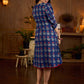 Royal blue Jaipur-printed dress featuring red rose motifs, a pintuck neck patch with red accents, and balloon 3/4th sleeves, creating a graceful silhouette with a blend of artisanal charm and contemporary elegance.