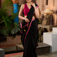 Pure black cotton saree with zari border & pom poms