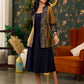 Exquisite Gold Silk Jacket with Black Shimmer-Striped Collar and Warli Printed Accents on Open Front and Cuffs