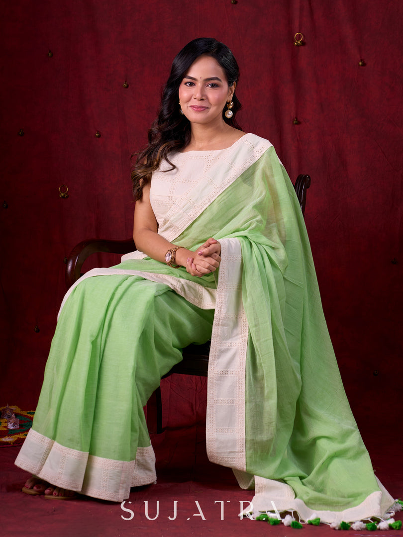 Soft Pastel Green Mul Cotton Saree Adorned with Delicate Hakoba Border & Pallu
