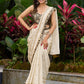 Timeless ivory tissue saree featuring zari embroidery and Banarasi accents