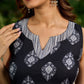 Black viscose sleeveless short kurta elevated with artistic stripe–floral patterns