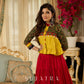 Red tiered Jamdani lehenga with a striking green Ajrakh and mustard jamdani choli featuring intricate mirror work & shell tassels .