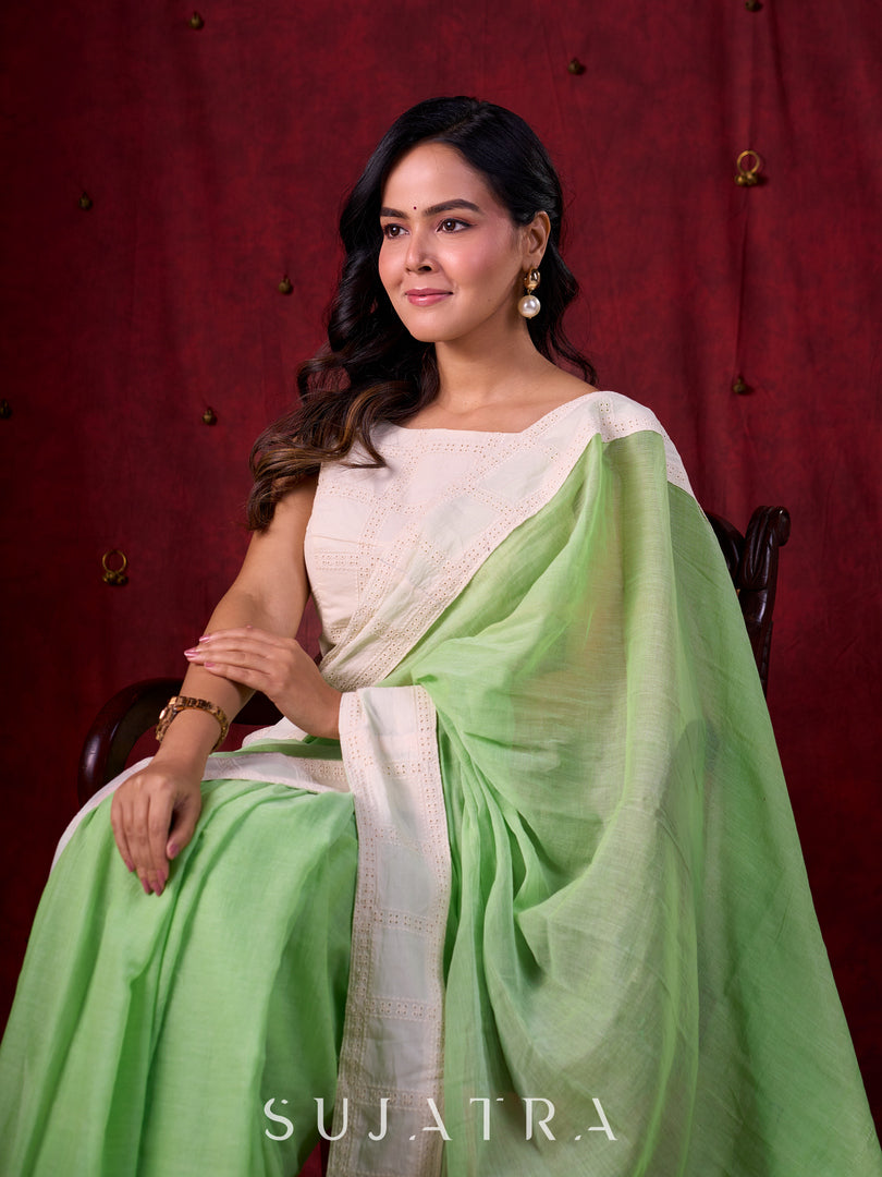 Soft Pastel Green Mul Cotton Saree Adorned with Delicate Hakoba Border & Pallu