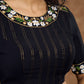 Elegant intrigue : Make a statement with this stunning black cotton silk blouse showcasing a distinctive neckline embroidery.