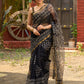 Classic black Kota saree with bold handblock prints and golden borders