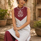 Minimal White Cotton Sleeveless Kurta with Bold Maroon Check V-Yoke & Tonal Embroidery