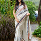 Classic off-white cotton saree with subtle Jamdani-style woven motifs