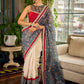 Flourishing Ivory Kalamkari Floral Chanderi Saree with Red Zari-Trimmed Hem & Chevron Border Accent
