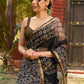 Classic black Kota saree with bold handblock prints and golden borders