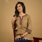Ethnic dark beige cotton top highlighted with elegant ajrakh detail.