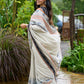 Classic off-white cotton saree with subtle Jamdani-style woven motifs