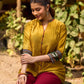 Mustard Cotton Silk Top With Pleated Yoke And Contrasting Ikat Detailing On Sleeves And Collar