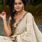 Timeless ivory tissue saree featuring zari embroidery and Banarasi accents