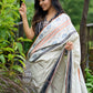 Classic off-white cotton saree with subtle Jamdani-style woven motifs