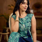 Indigo printed dress featuring playful fish motifs, designed in a gathered side-panel silhouette with contrast navy blue accents, creating a fluid, contemporary look with refined artisanal charm.