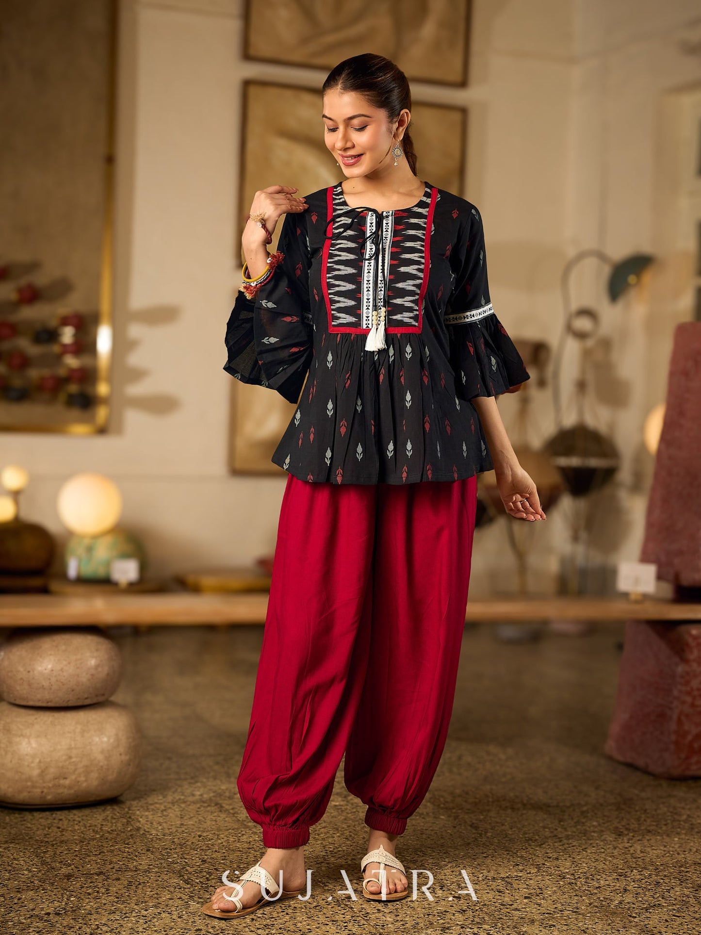 Contemporary Black Printed Cotton Top with Ikat Yoke and Flared Sleeves featuring Ikat Borders