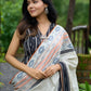 Classic off-white cotton saree with subtle Jamdani-style woven motifs