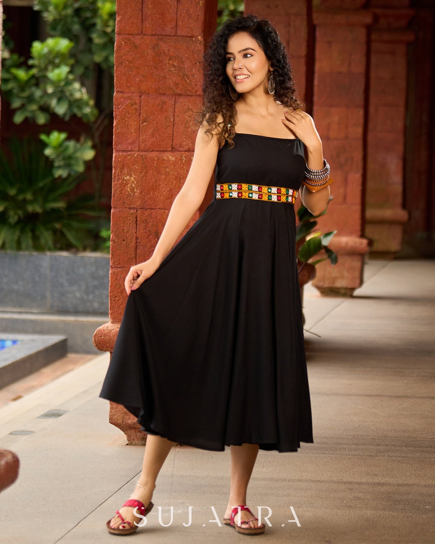 Black Rayon Double-Flared Sleeveless Dress with Mirror Work Embellishments  -  Patchwork Ajrakh Jacket Additional