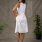 Graceful White lotus printed dress with elegant olive accents.
