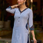 chic blue striped kurta adorned with peeking ajrakh accents on the pocket and sleeves.