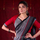 Grey Mul Cotton Saree with Checkered Border & Red Tassel Detailing