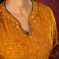 Marigold Yellow Bandhani Asymmetrical Kurta with Kalamkari Accents and Minimal Embellishments