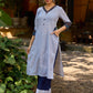 chic blue striped kurta adorned with peeking ajrakh accents on the pocket and sleeves.
