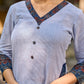 chic blue striped kurta adorned with peeking ajrakh accents on the pocket and sleeves.