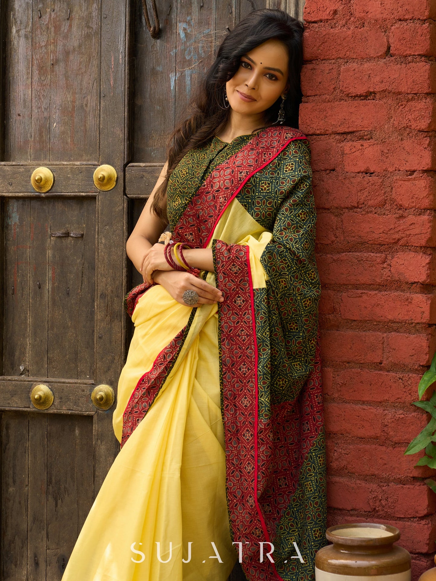 Sunlit yellow cotton contemporary Ajrakh combination saree