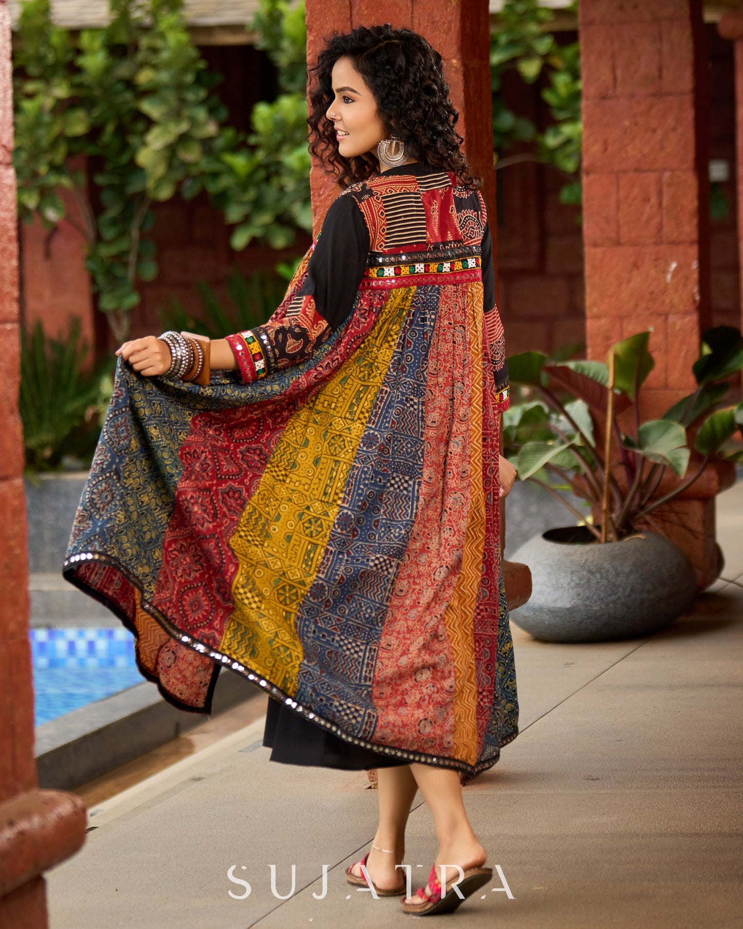 Black Rayon Double-Flared Sleeveless Dress with Mirror Work Embellishments  -  Patchwork Ajrakh Jacket Additional